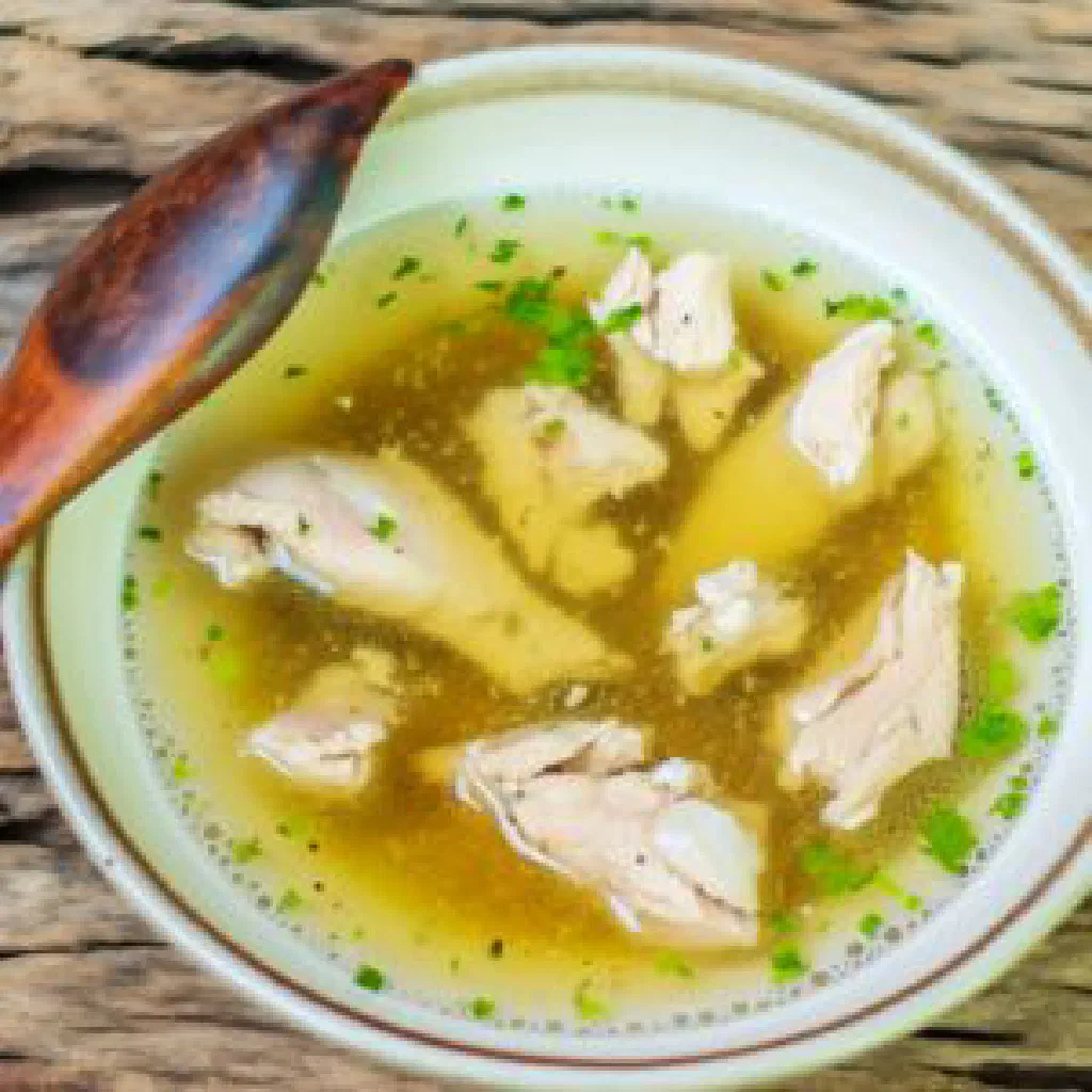 Ovdukh served in a shallow bowl with fresh herbs