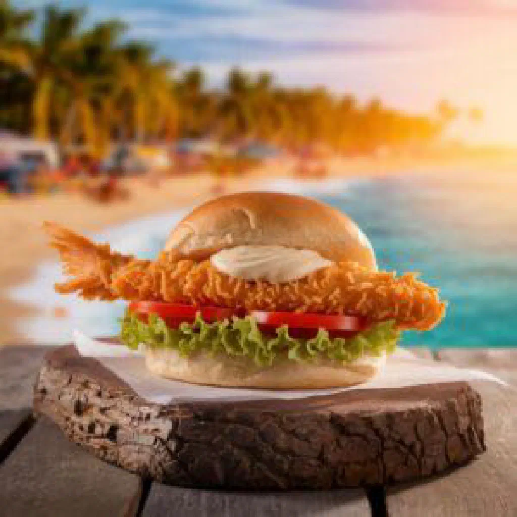 Golden fried flying fish tucked inside a soft bread roll with spicy sauce