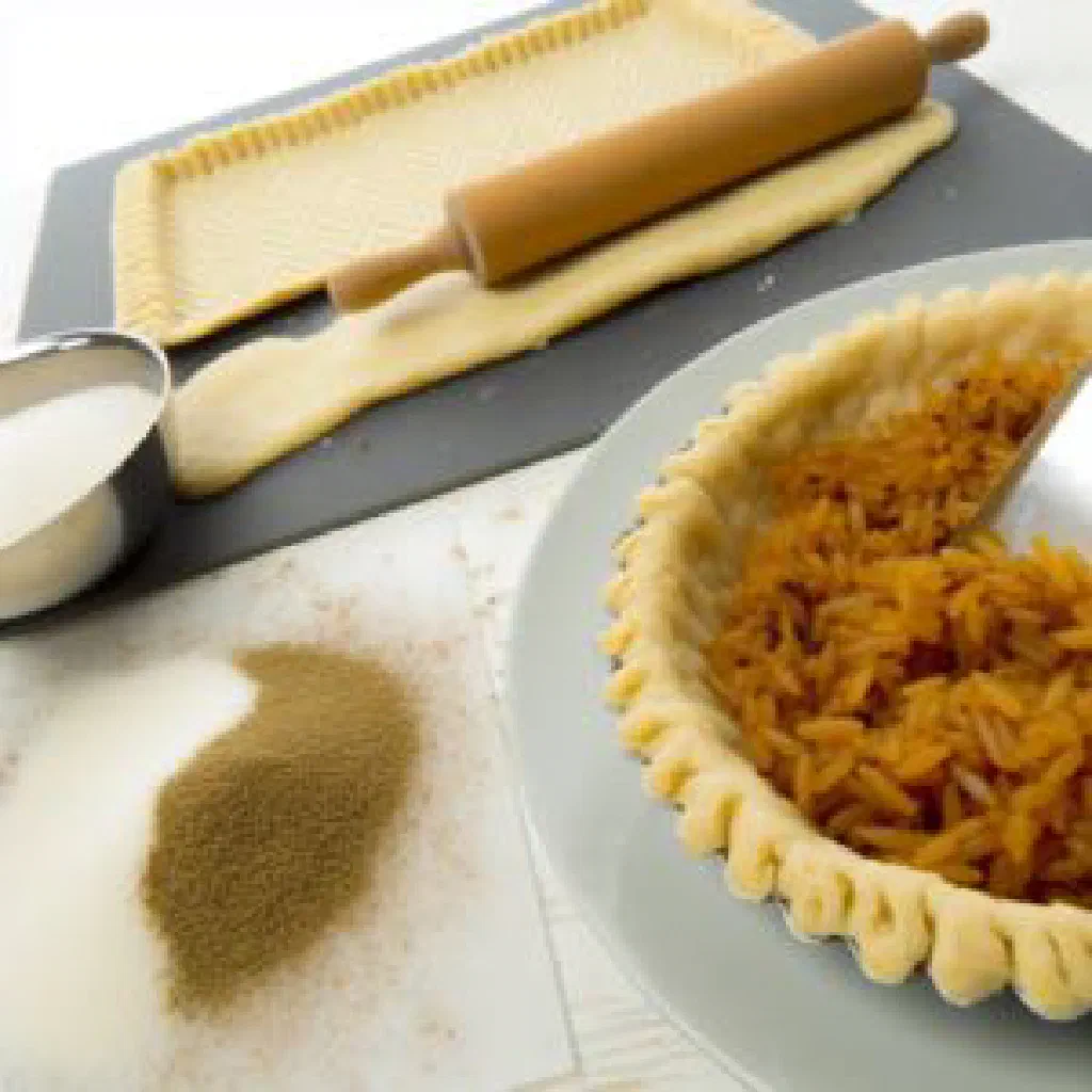 Golden Belgian rice tart with a creamy rice filling in shortcrust pastry