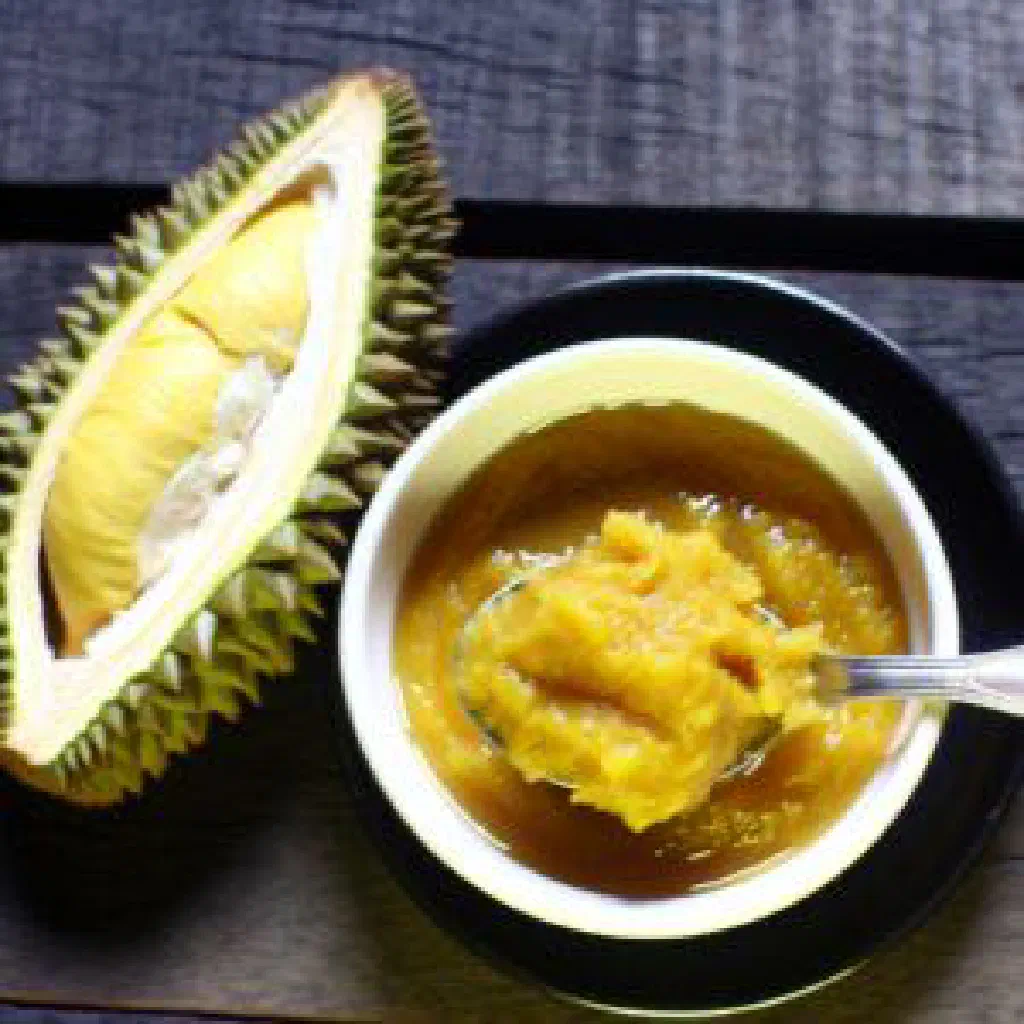 Baked pati durian custard set in a small dish and garnished with mint