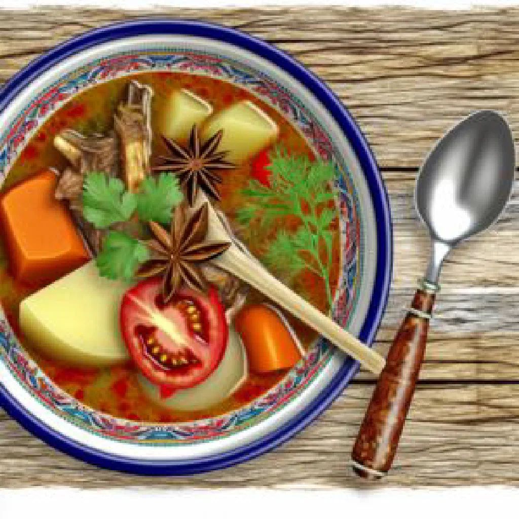 Bowl of Sup Ekor oxtail soup garnished with coriander and spring onions