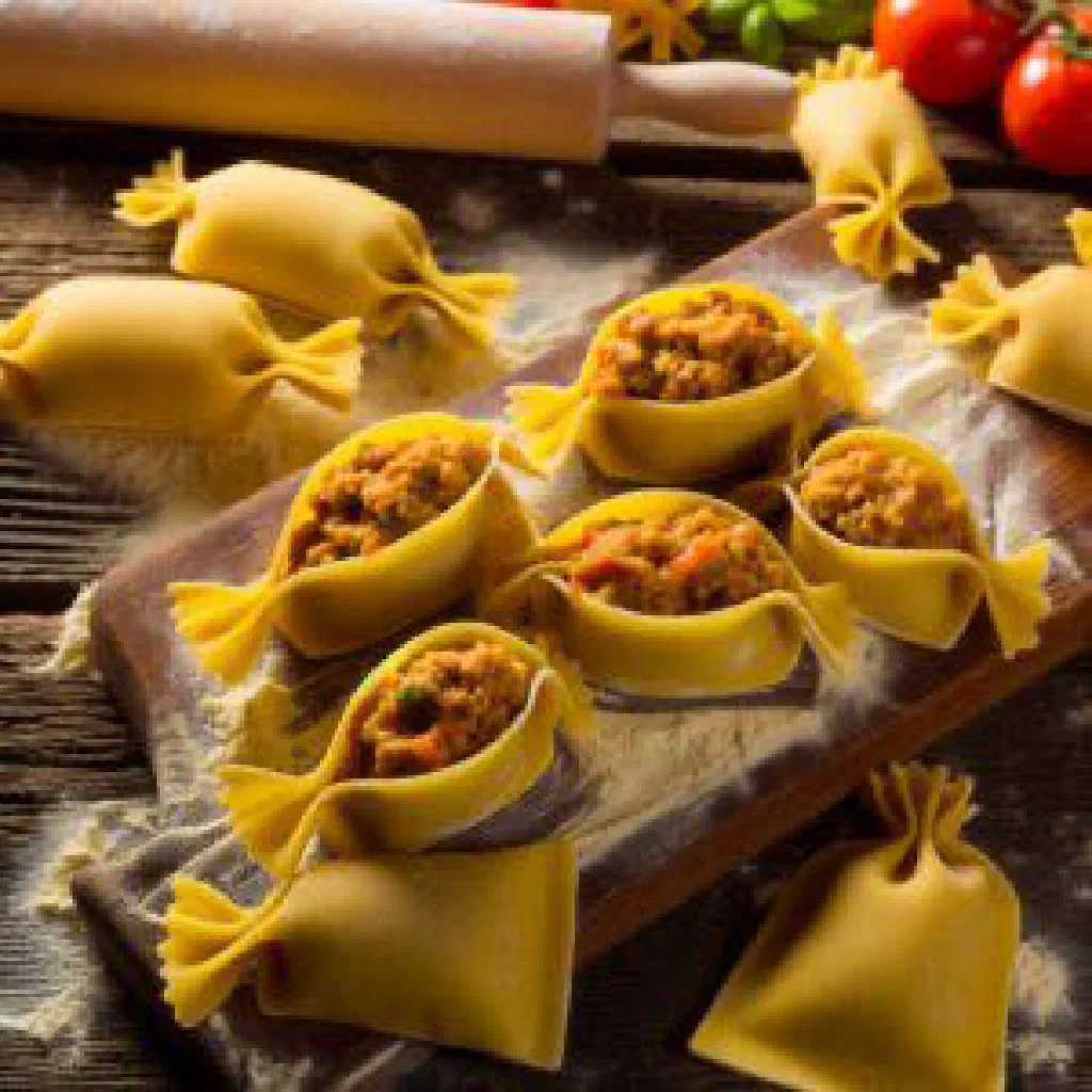 Golden fried Krempleni dumplings served warm on a plate with fresh herbs