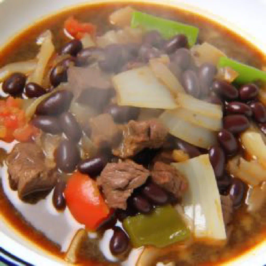 Slow-cooked beef and beans Matura et Mayirunge served in a rustic bowl