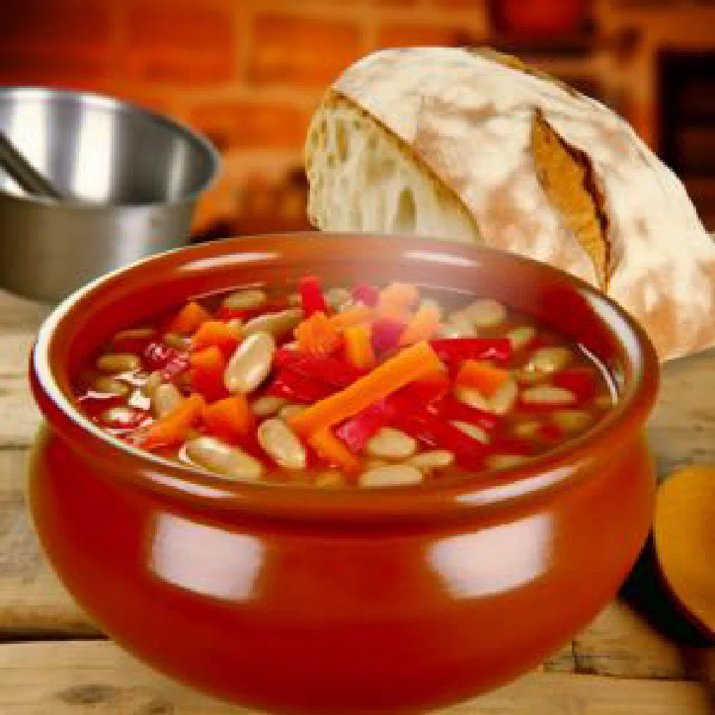 Camoca bean and vegetable stew garnished with fresh parsley