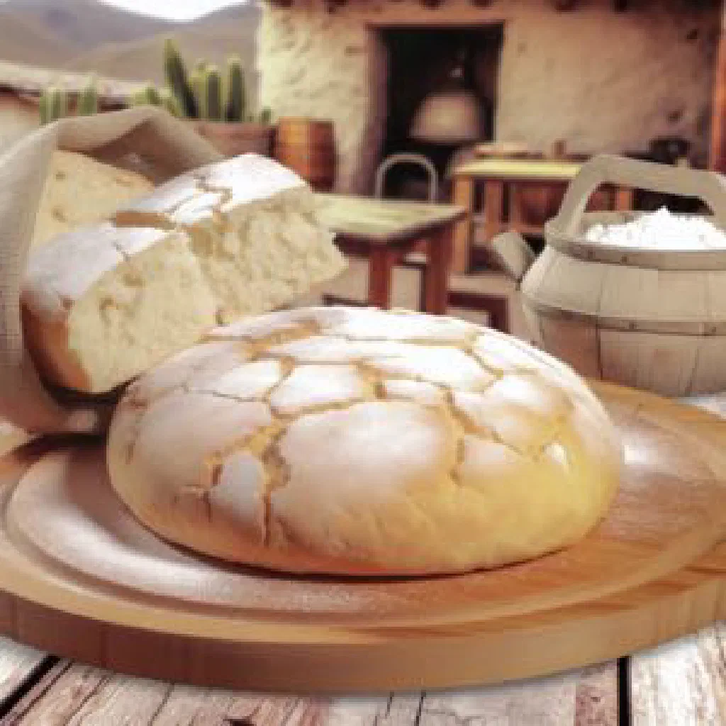 Slice of Costa Rican queque seco, a spiced pound cake dusted with icing sugar