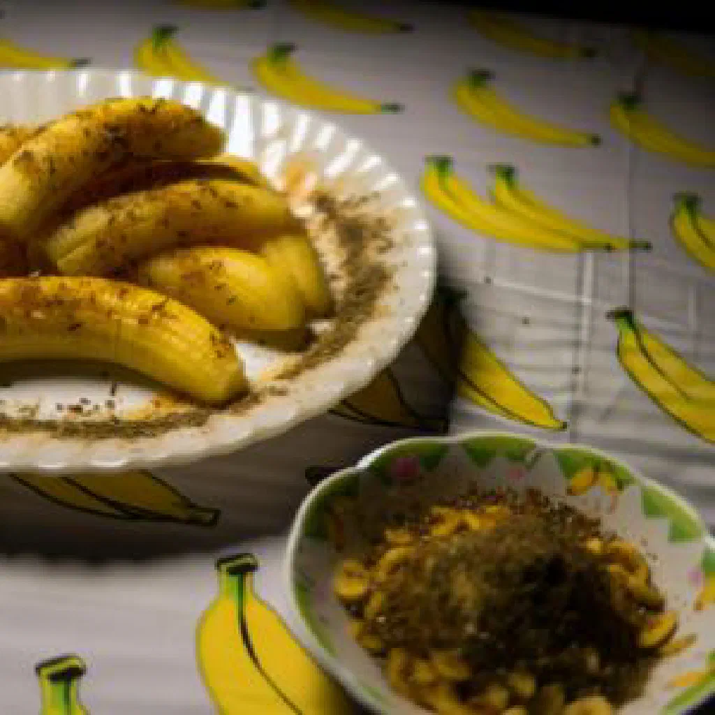 Golden pan-fried spiced banana slices dusted with cinnamon and nutmeg