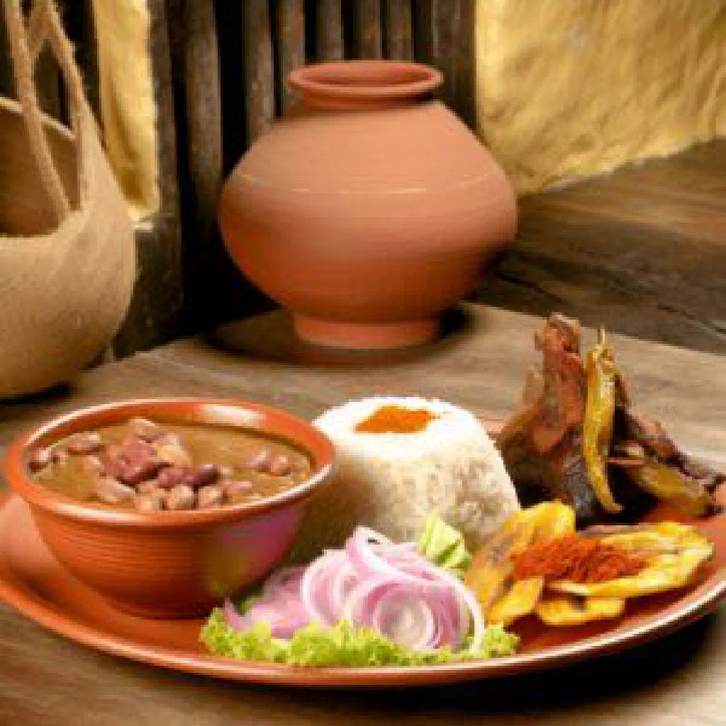 A bowl of Ecuadorian menestra de frijoles with rice and fried plantain