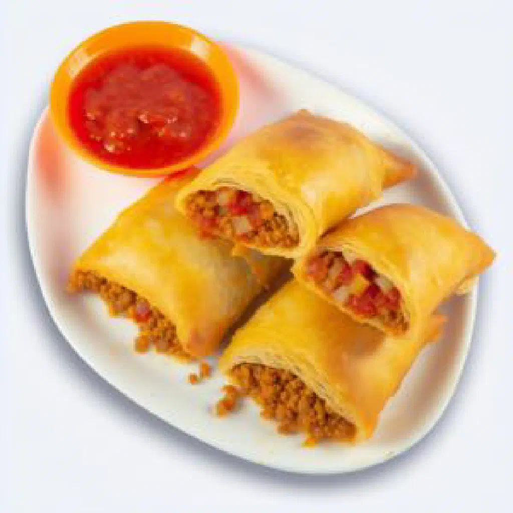 Golden baked rokak pastry rolls on a plate