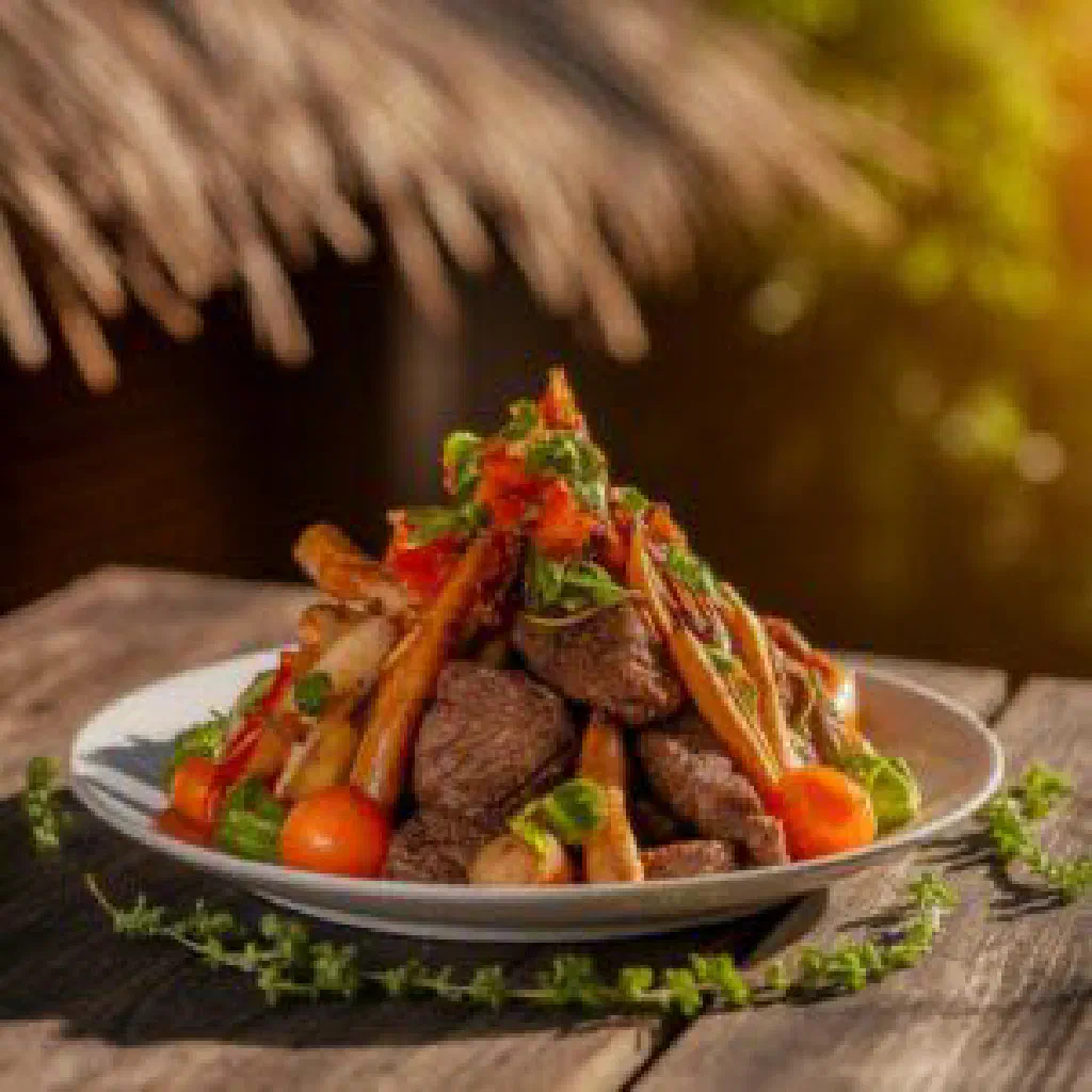 Umncweba, a hearty Swazi dish of tender meat and vegetables garnished with fresh herbs