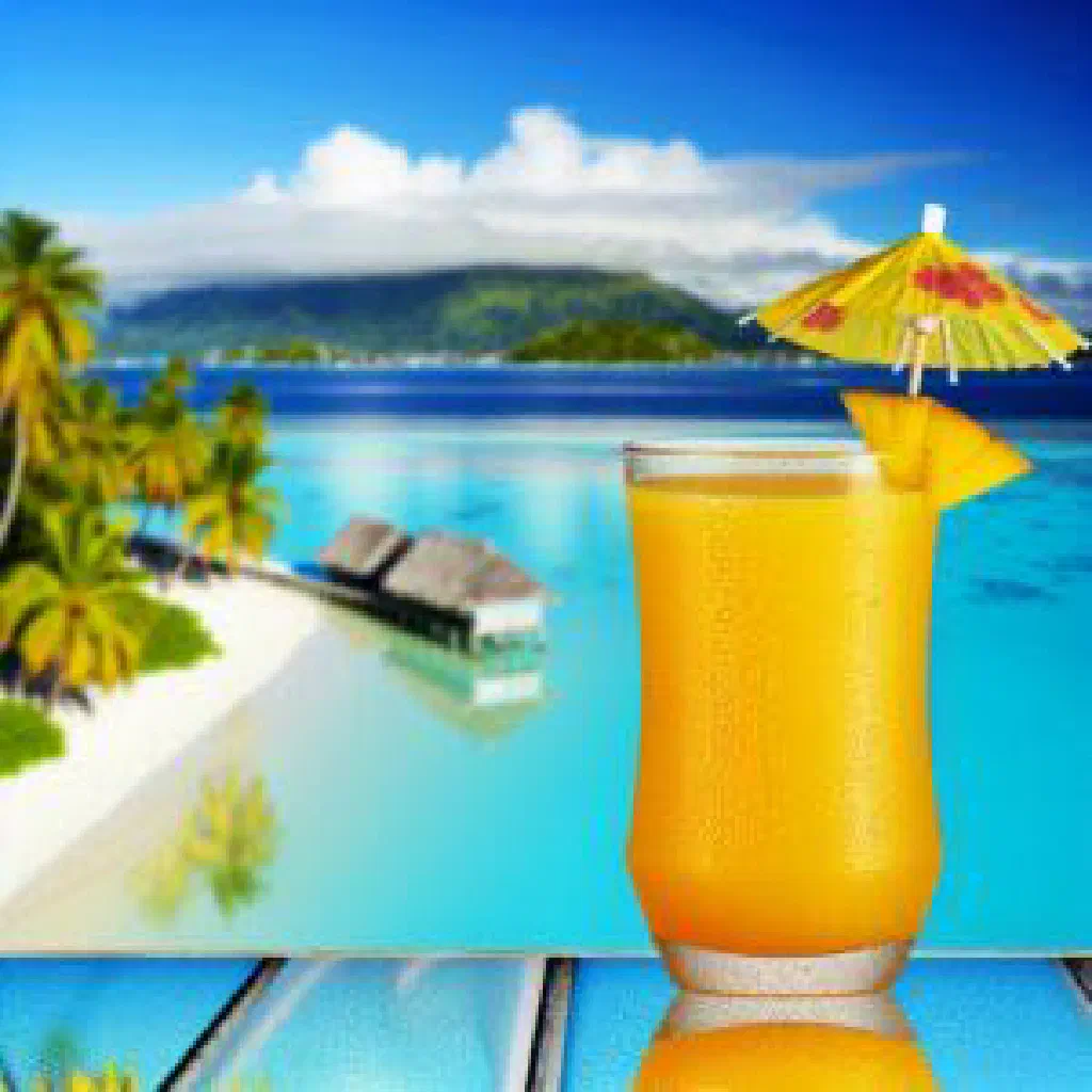 A glass of fresh Fijian mango juice garnished with mint