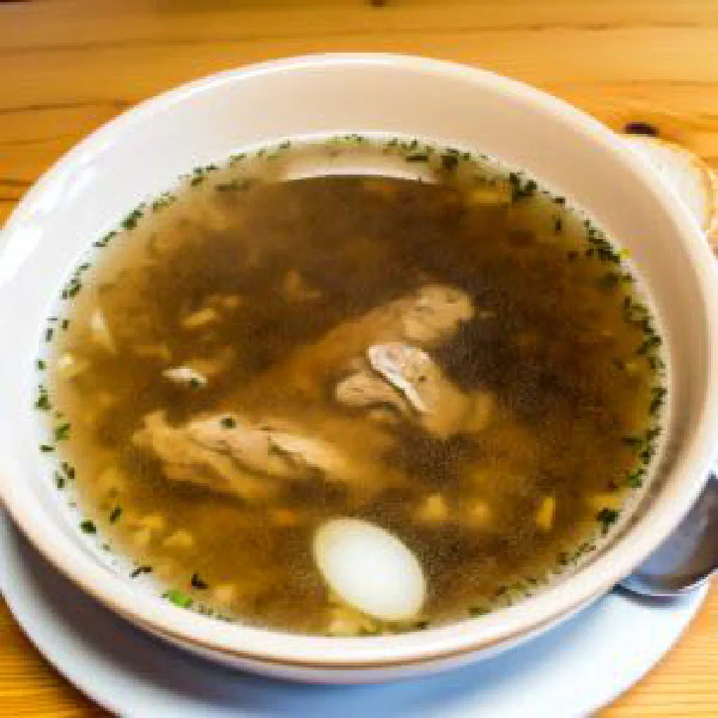 Slow-braised Georgian gaba with tender meat and fresh herbs