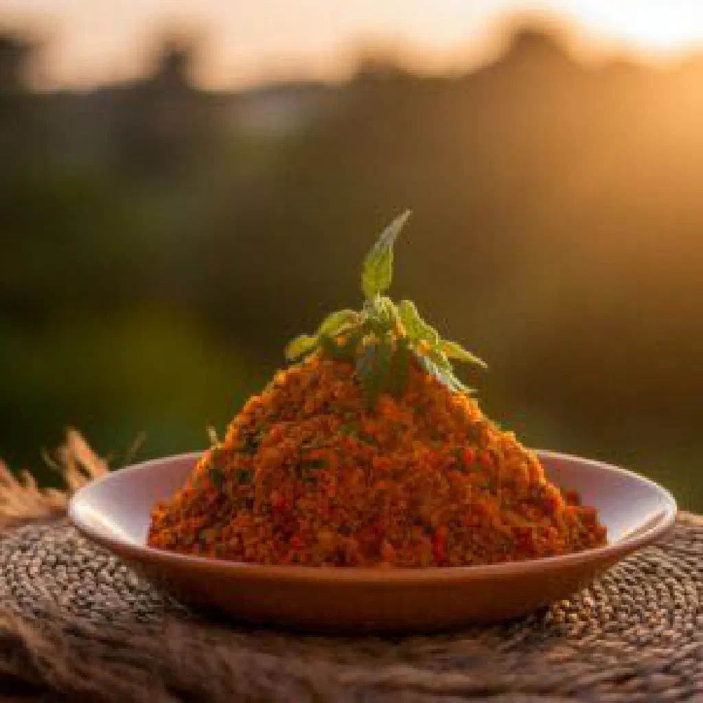 Kyenam with tender chicken pieces served over savoury rice