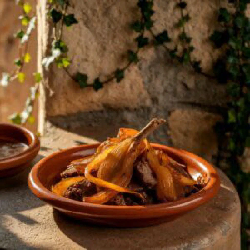 Glykaniso dessert of dried fruit and nuts in syrup served in a glass