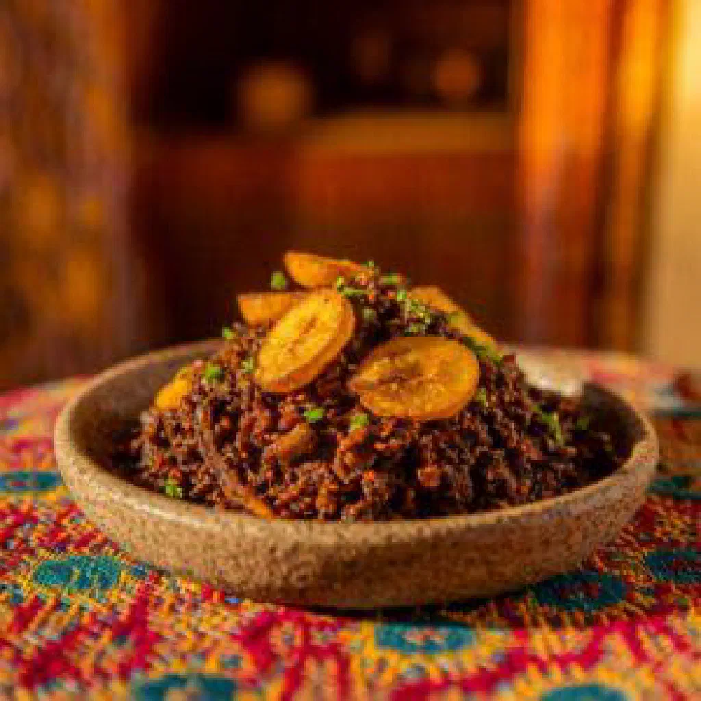 Gboma dessi, a Guinean stew of leafy greens and tender meat in a rich sauce