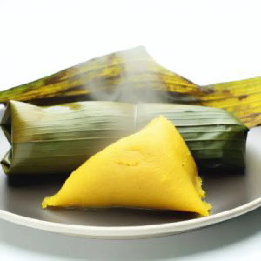 Doukounou parcels of steamed cornmeal wrapped in banana leaves