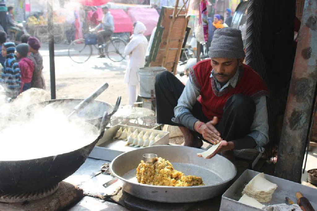 Golden, crispy fried samosas with a spiced potato and vegetable filling
