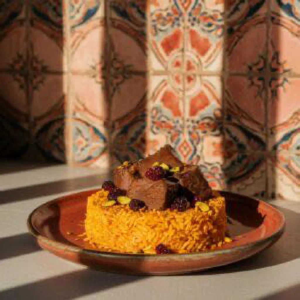 Naz Khatun with tender meat, fragrant rice and fresh herbs