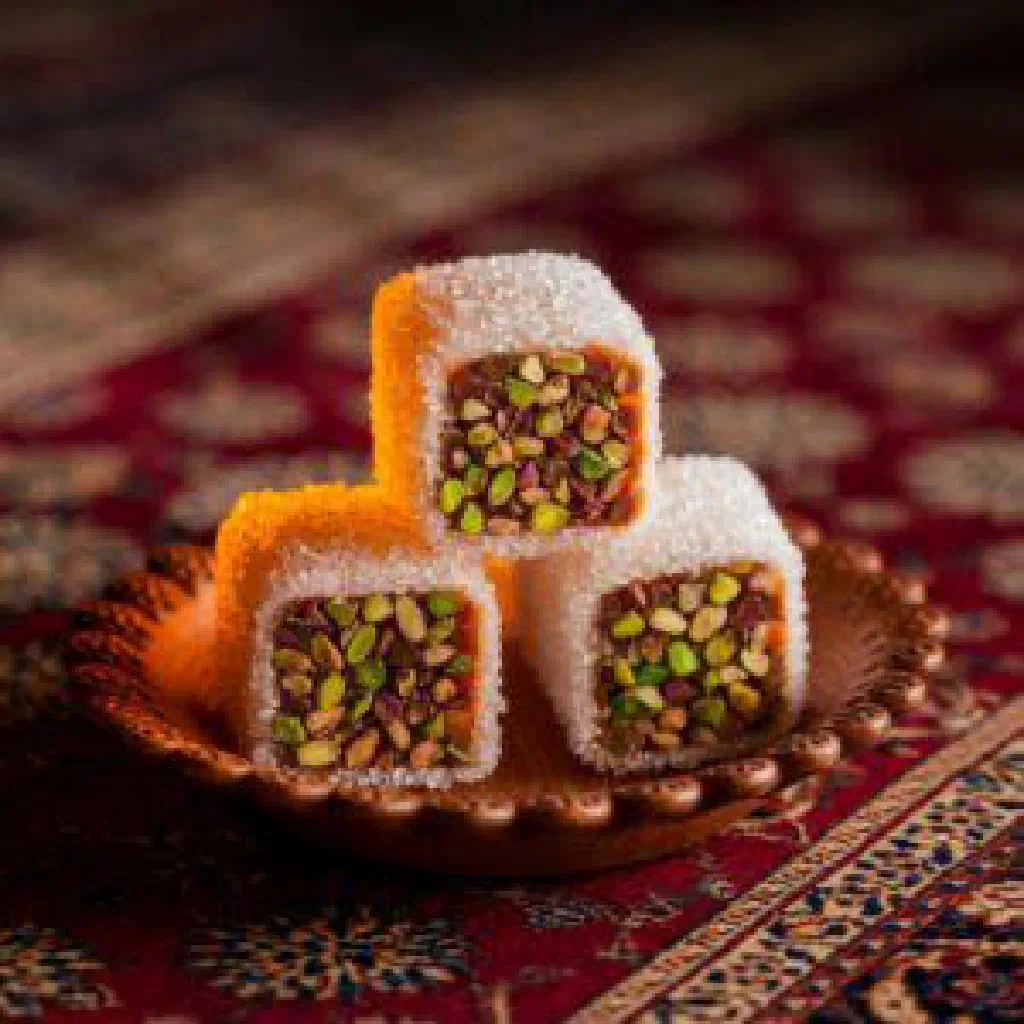 Sugar-coated Persian noghl almonds arranged in a small dish