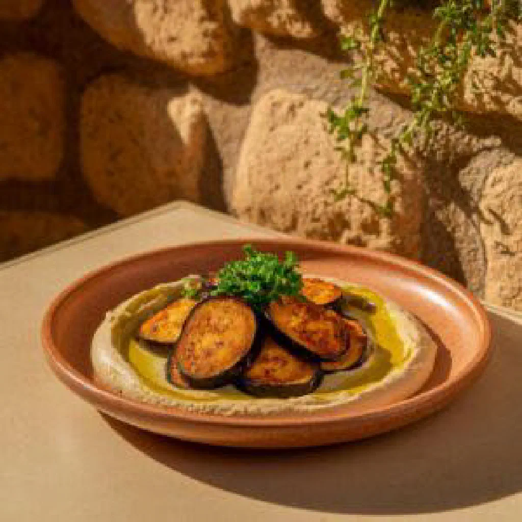 Slow-baked Tbeet with spiced chicken and rice under a crisp golden crust