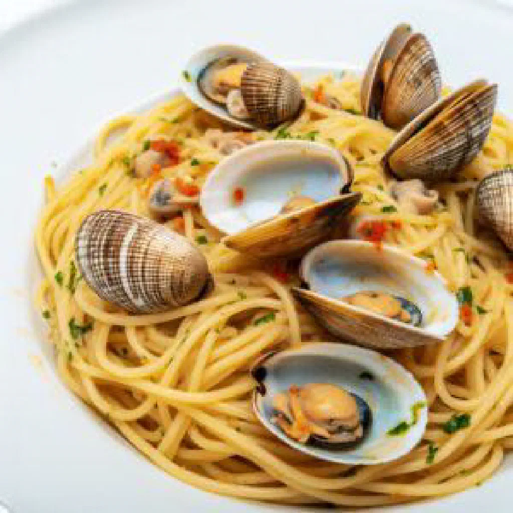 Spaghetti alle vongole with clams, parsley and a squeeze of lemon