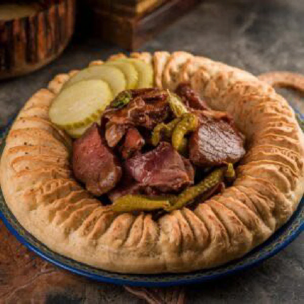 Golden fried Kazakh burak pastries filled with spiced minced meat