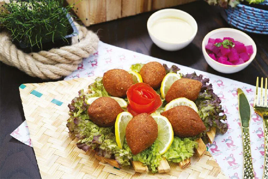Golden fried kibbeh patties of bulgur and spiced minced meat