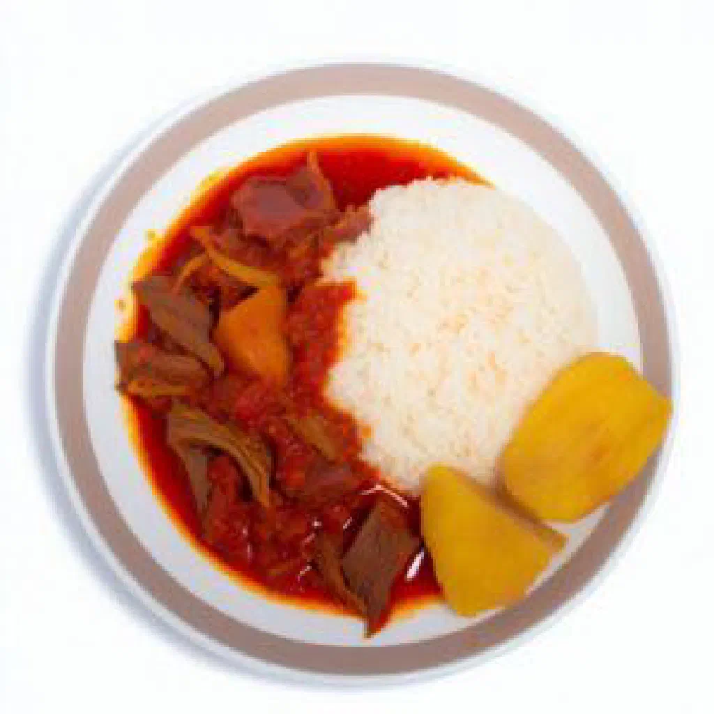 Slow-cooked shredded Varenga beef served with fluffy white rice