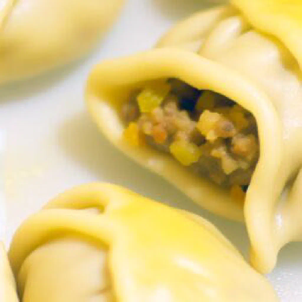 Golden fried Bis Keemiya pastries filled with spiced fish
