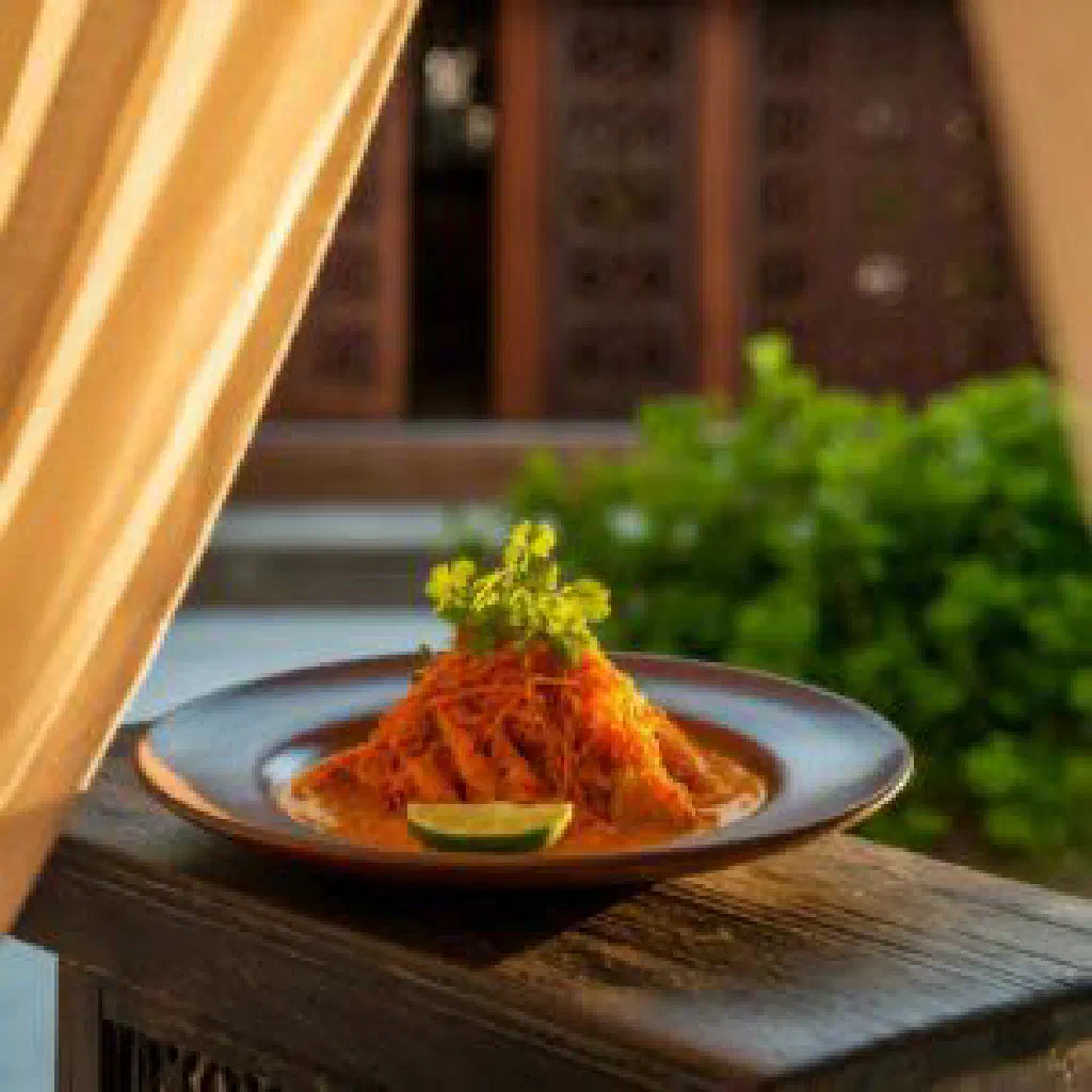 Maldivian fish curry in coconut milk garnished with fresh coriander
