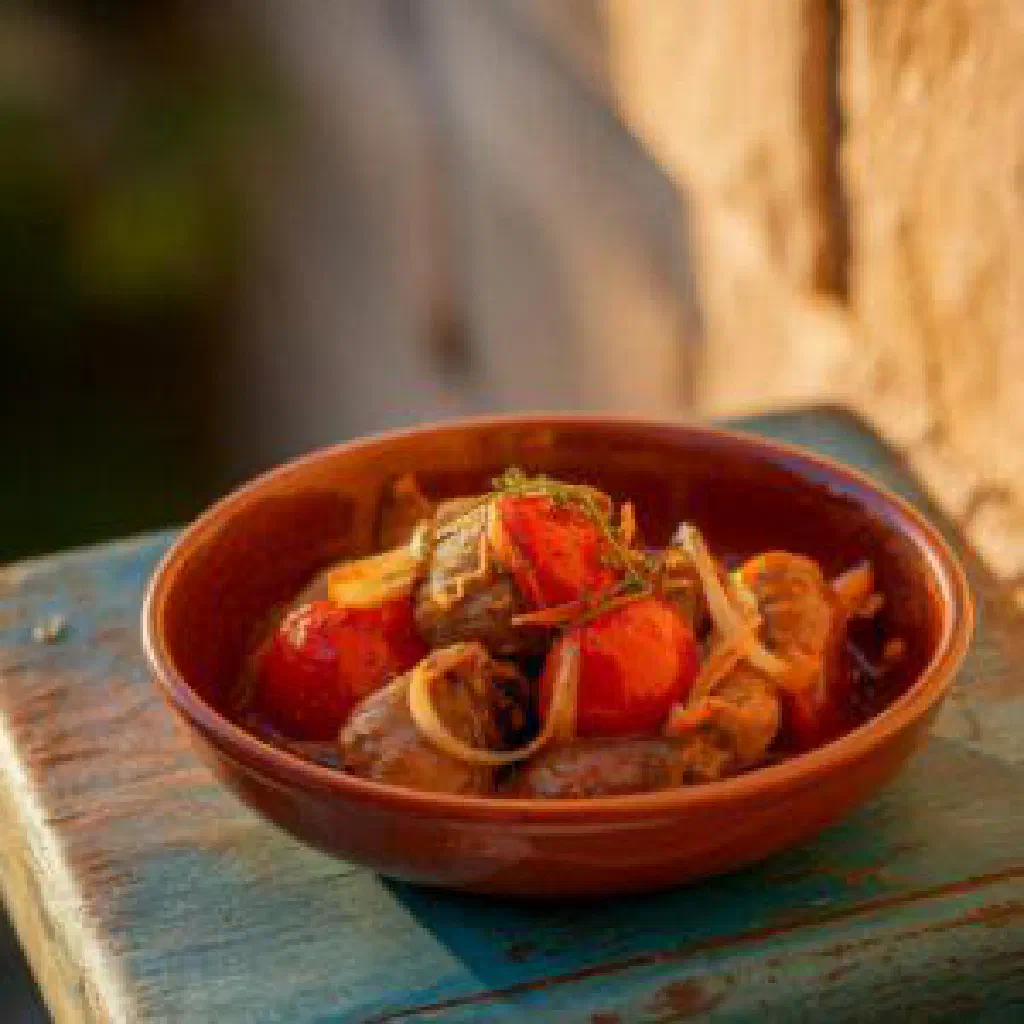 Maltese kappunata with aubergine, peppers and tomatoes in a shallow dish