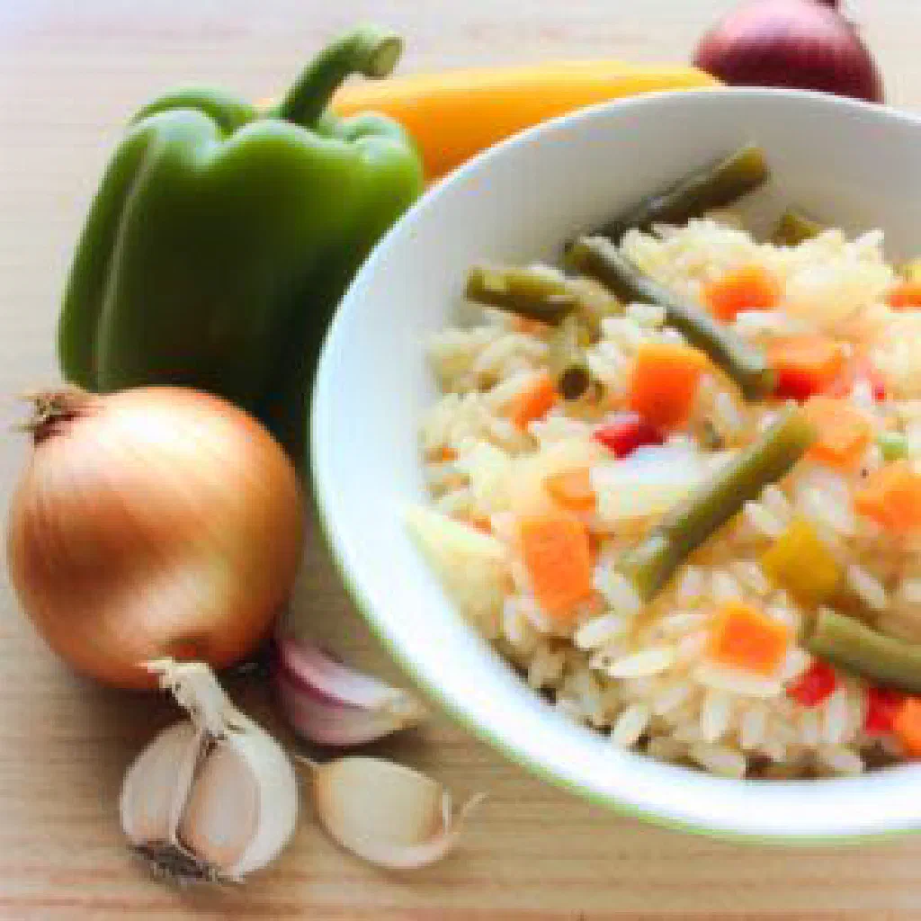 Spiced rice and vegetable bhuttan garnished with fresh herbs