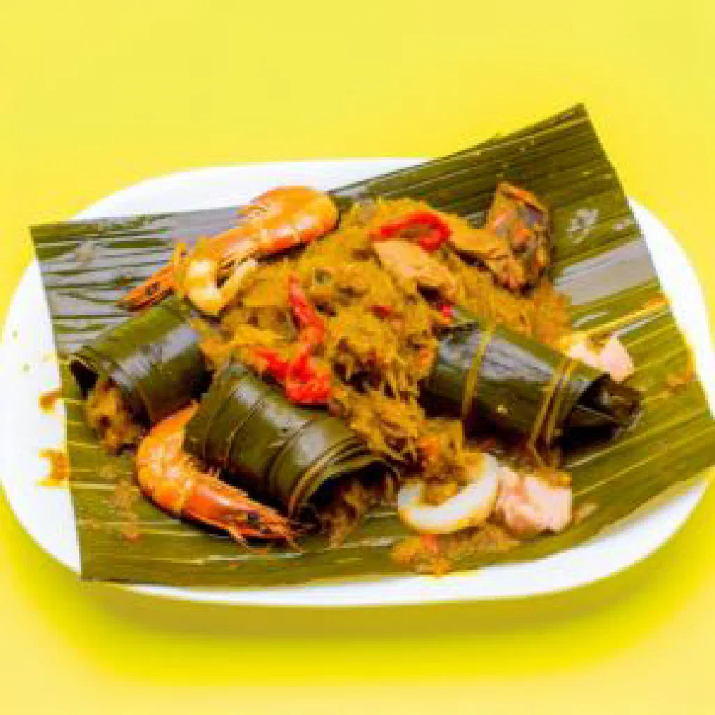 Ekwang, grated cocoyam wrapped in leaves and simmered in a rich palm oil sauce