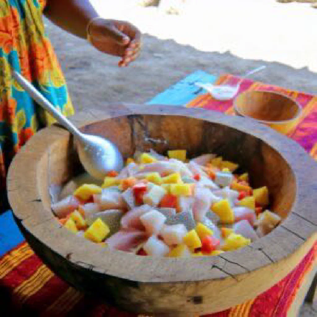 Bowl of Samoan oka with raw fish, coconut milk, tomato and onion