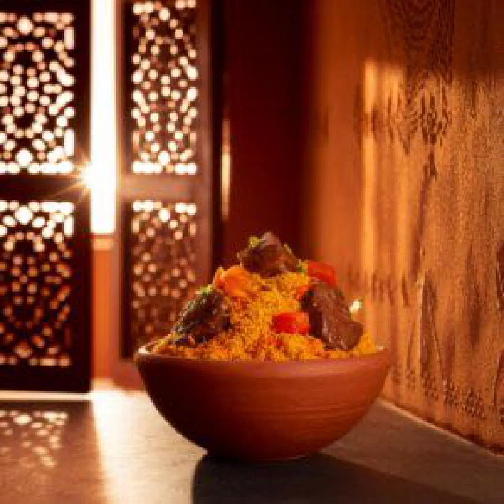 Senegalese yapp beef in a rich peanut sauce garnished with fresh coriander