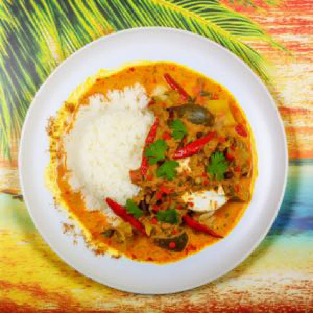 Seychellois kari koko chicken curry in coconut milk, garnished with fresh coriander