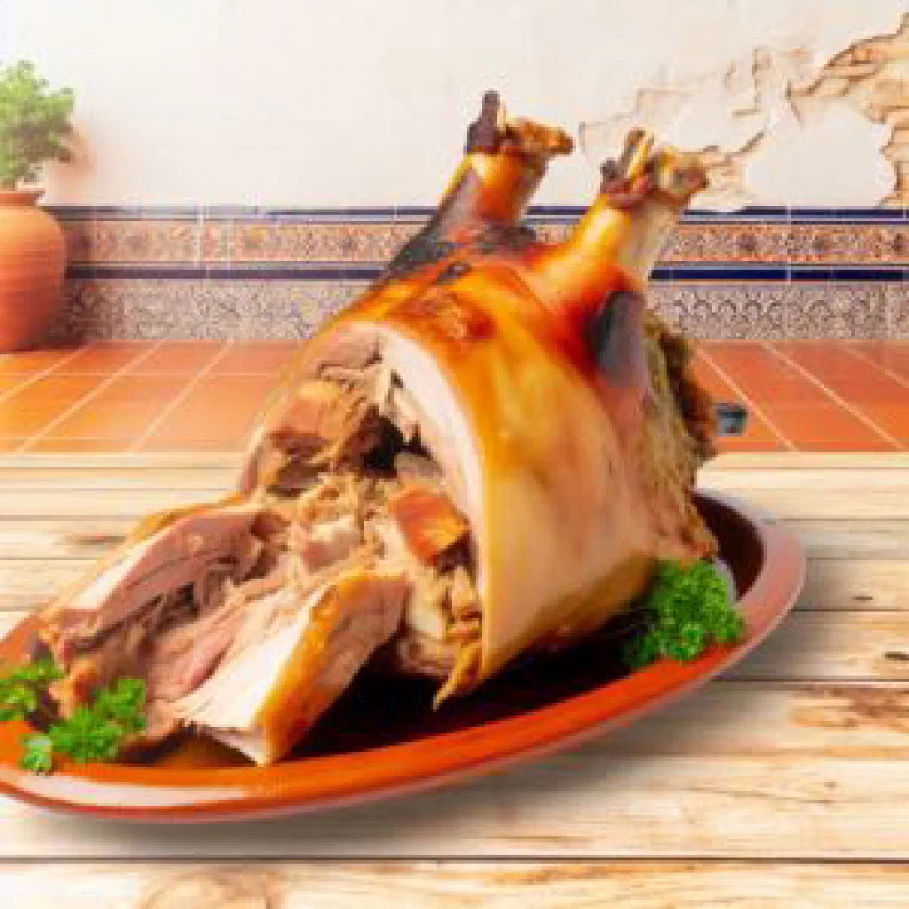 Golden roast suckling pig with crisp crackling on a platter