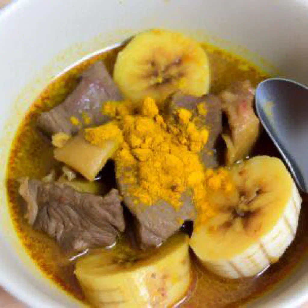 Tanzanian ndizi — green bananas simmered with beef in a golden turmeric sauce