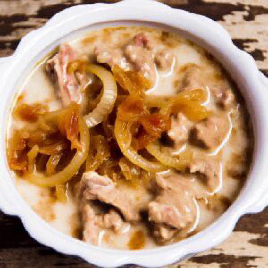 Mhamsa pasta in a spiced tomato sauce with tender pieces of meat
